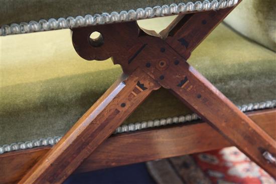 A Victorian Reformed Gothic walnut and marquetry Reclining Chair, designed by Charles Bevan, c.1865, under licence to Marsh, Jones &